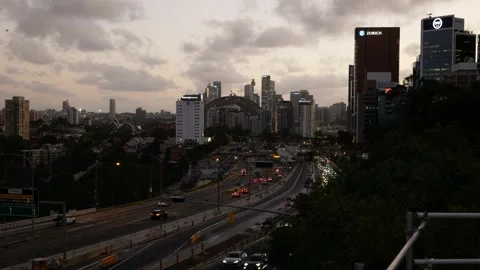 Late evening city commuters leave Sydney CBD 6K Stock Footage 300051159