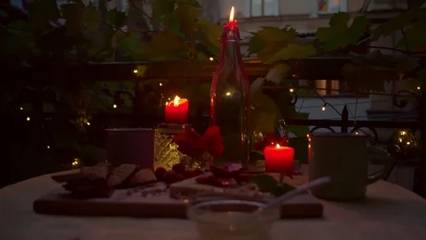 Late evening romantic table with candle light Stock Footage 87702534