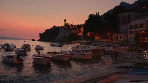 Late evening in a sea pier with different boats. Stock Footage 296391801