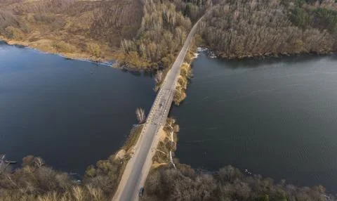 Late fall. Bridge over the river. Stock Photos