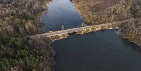 Late fall. Bridge over the river. Stock Photos