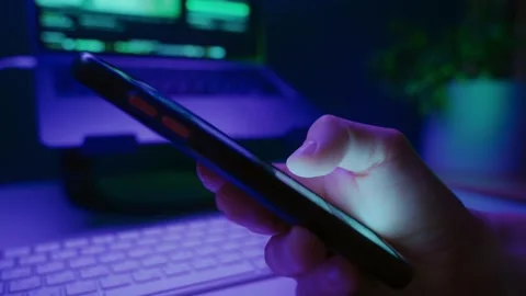 Late-night doom scrolling on smartphone screen 스톡 동영상 322780713