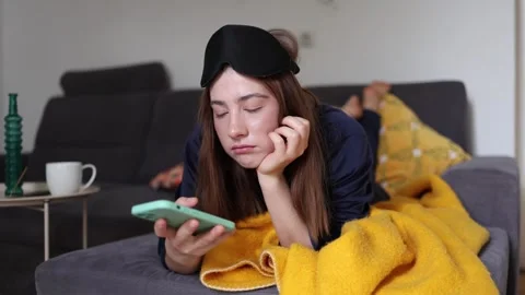 Late night dopamine scrolling on smartphone Vídeo Stock 341233908
