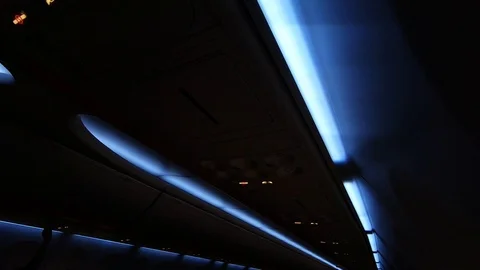 Late Night Flight. Slow Motion Of Lights Inside Airplane Interior Stock Footage 112563814