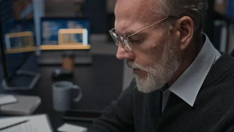 Late Night Office Coding by Senior Software Developer Stock Footage 324047276