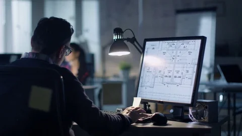 Late at Night in the Office. Design Engineer Works on His Personal Computer.  Stock Footage 72289481