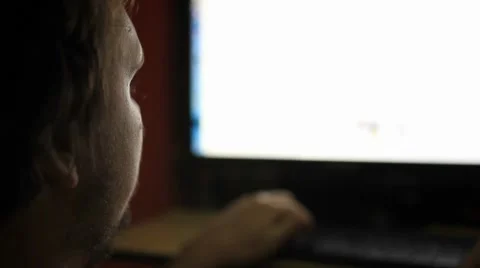 Late night office worker working overtime in dark office. HD. 1920x1080 Stock Footage 43238633