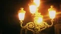 Late night in old medieval city, street lamp lighting ancient clock, history HD Footage