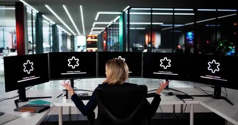 Late Night Tech Support Helps Woman Troubleshoot Slow Computer Stock Photos