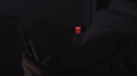 Late night texting in bed Video stock 37510159