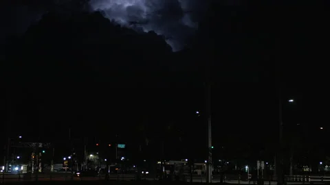 Late Night Thunderstorm with traffic Stock Footage 153733004