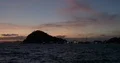 Late sunset with island hills and indonesian harbor at Flores Sea 4k or 4k+ Resolution
