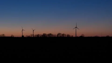 Late sunset witf electric generators. 스톡 동영상 221427488