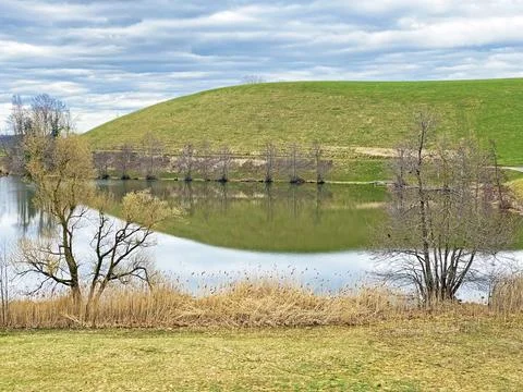 Late winter and early spring on the small natural lake Wilersee or Wiler lake Stock Photos
