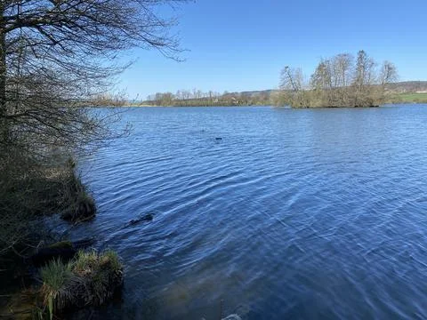 Late winter and early spring on the lake Mauensee or Lake Mauen (Mauesee) Stock Photos