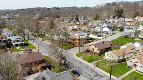 Late Winter Flyover of Typical Pennsylvania Small Town Neighborhood  	 Stock Footage 88745697