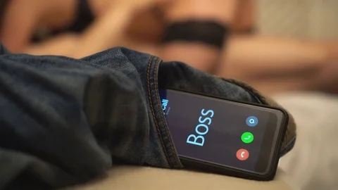 Late for work concept. Boss calling at the wrong time. Stock Footage 83074677