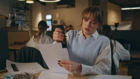 Late worker sorting papers at evening office closeup. Woman staple documents Video stock 280212995