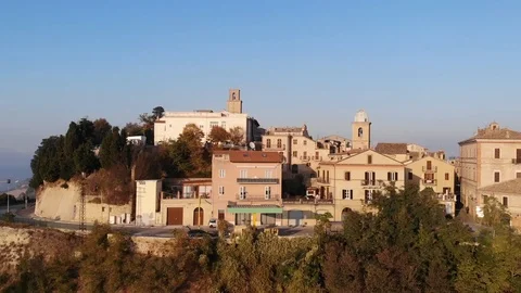 Lateral aerial drone view over a mediaeval italian town Stock Footage 113284496