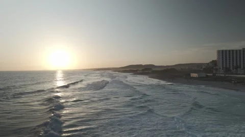 Lateral Aerial Flight Along Son Bou Beach to Sea at Sunset Stock Footage 344438269