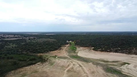 Lateral aerial view of forest and dry area (3) Stock Footage 273489288