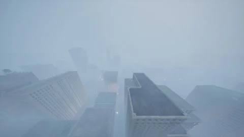 Lateral camera movement from right to left over a foggy city. Stock Footage 265133508