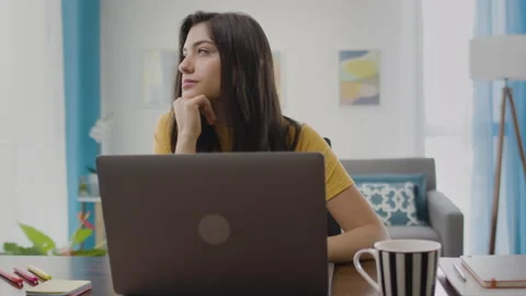 Lateral Dolly Slow Motion of Thoughtful Caucasian Woman Typing on Laptop Stock Footage 164089293
