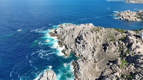 Lateral Drone Flight Along Capo Testa Rocky Coastline in Sardegna Stock Footage 332234968