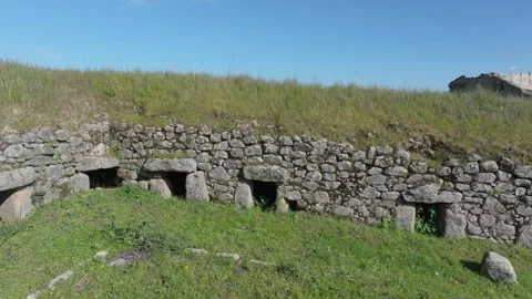 Lateral drone flight inside 18th-century stone structure for pig farming Stock Footage 308900461