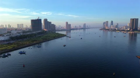 Lateral drone flight over Han River at sunrise in Da Nang, Vietnam Stock Footage 340874515
