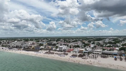 A lateral drone flight over Puerto Progreso, showing the beachfront city with Video stock 321452779
