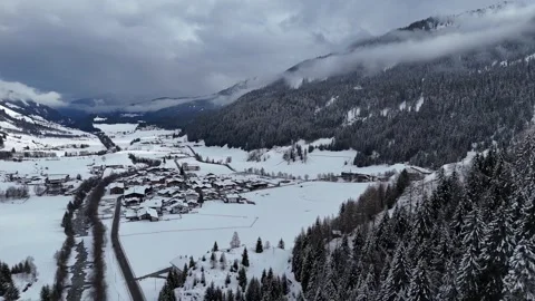 Lateral Drone Flight Over Snow-Covered Village of Maiern in Val Ridanna, 库存影片 336358841