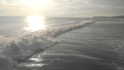 Lateral drone view of the foaming wave  Stock Footage 128959003