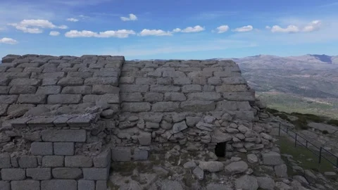 Lateral flight with a drone and a close-up of the 14th century hermitage Stock Footage 276152437