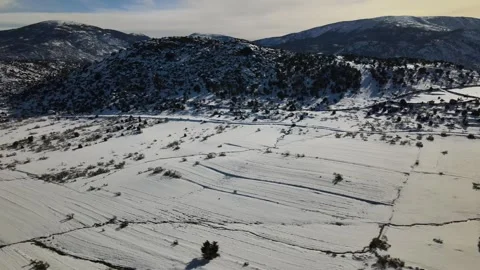 Lateral flight with a drone over a slope of a mountain with a large 動画素材 272776629