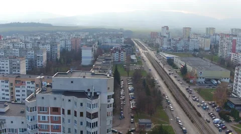 Lateral flight over the city with high panel houses in the Balkans Aerial Stock Footage 58254282