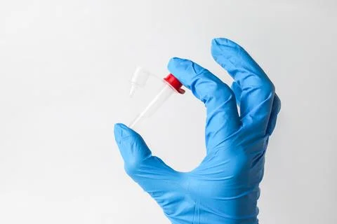 Lateral-Flow-Test covid rapid home- step 3 - squeeze and shake plastic tube Stock Photos