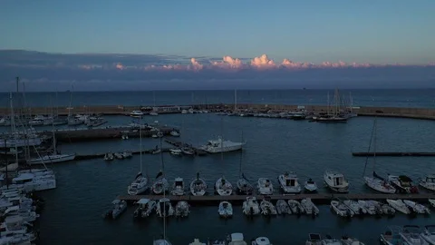 Lateral pan in the harbor full of ships and sailboats Stock Footage 119574665
