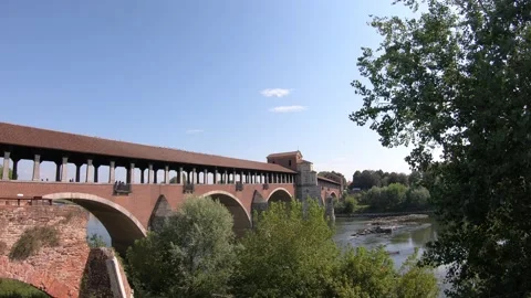 Lateral pan shot of the Covered Bridge of Pavia Video stock 137295654