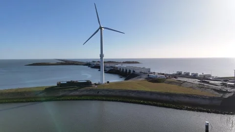 Lateral pass across giant lock basin and power structures Stock Footage 331839170