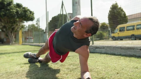 Lateral Plank Position On The Grass Stock Footage 279448799