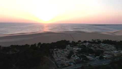 Lateral tracking overall shot with camping foreground at Dune du Pilat, France Stock Footage 333108356