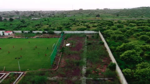 Lateral tracking shot along Youssoupha Ndiaye training camp, Senegal Stock Footage 331989943
