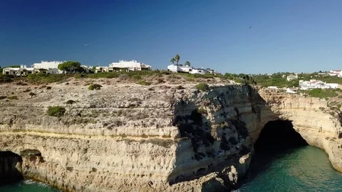 Lateral tracking shot of Benagil beach, Portugal Stock Footage 83431654