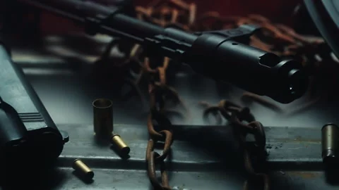 Lateral tracking shot of a weapon arsenal, with red flashing light Stock Footage 337727295