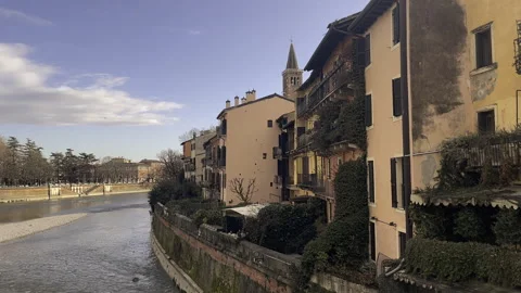Lateral Tracking Shot Winter Cityscape with River and Medieval Architecture Stock Footage 309932680
