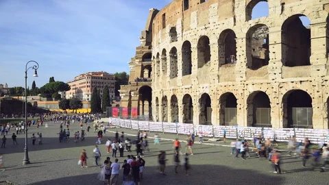Lateral view of Coliseum (Rome) in time lapse Stock Footage