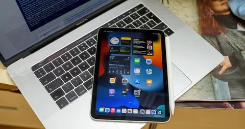 Latest Apple Computers iPad Mini Pro tablet computer with all apps on display on Stockfoto's