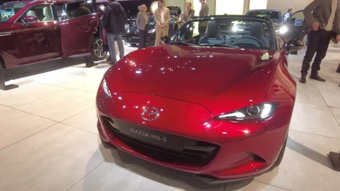 Latest vibrant red 2026 mazda mx 5 miata brussels motor show sports roadster Stock Footage 328206937