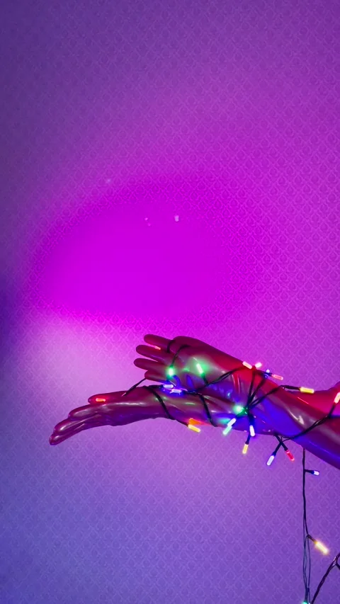 Latex Hands and Light Ball 2 Stock Footage 175764720